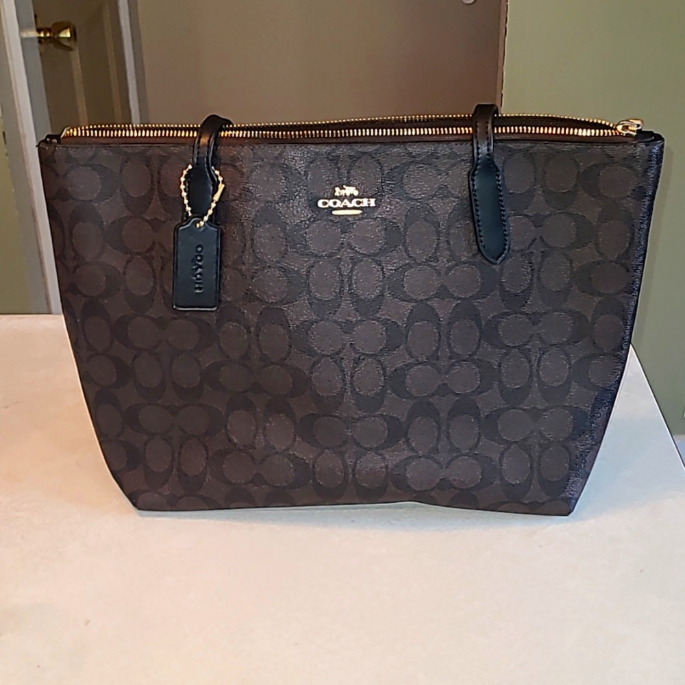 Coach 4455 zip top tote shoulder bag, leather brown and black. 15"W x 10"T
